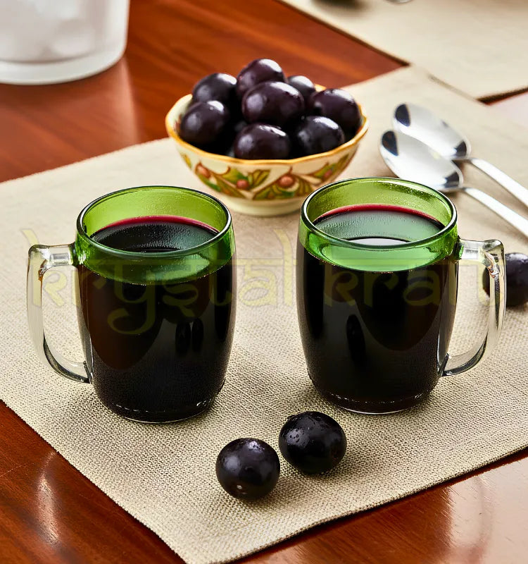 Handcrafted upcycled green glass bottle mug by Krystal Kraft designed for smoothies, juices, milkshakes, and artistic everyday drinkware use.