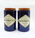 Artistic Hendrick’s-inspired upcycled glass jar set handcrafted by Raees Ahmed Merchant, featuring airtight cork lids for sustainable and elegant food storage.