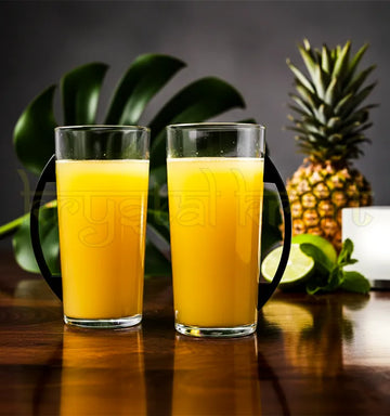 Handcrafted mugs made from upcycled Macallan whisky bottles with metal handles, displayed as a sustainable drinkware set.