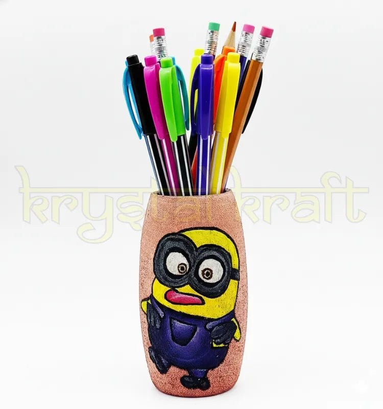 Hand-painted Minion-themed recycled glass bottle with a pink base and blue-yellow accents, designed by Farisa Merchant — a sustainable mini vase or pen stand.