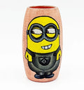Upcycled mini glass bottle painted with a playful Buoyant Minion in grey and yellow on a pink base — a handmade décor and gifting piece by Krystal Kraft.