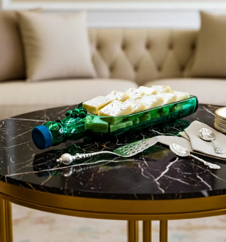 A handcrafted serving platter made from an upcycled Singleton glass bottle, featuring a polished, eco-friendly design perfect for serving appetizers and snacks sustainably.