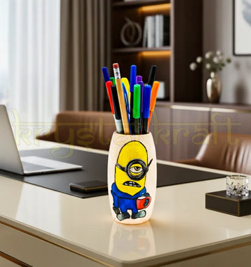 Handcrafted recycled glass bottle featuring a playful Workaholic Minion painting on a pink base with blue and yellow acrylic details — an eco-friendly décor accent by Krystal Kraft.