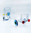 Zoom Zoom Truck Snack Server handcrafted from transparent glass by Krystal Kraft, made using a repurposed whisky bottle – versatile piece for serving snacks, flowers, or candles at home events.