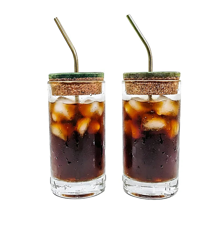 Eco friendly upcycled glass sipper on wooden table with water sustainable drinkware