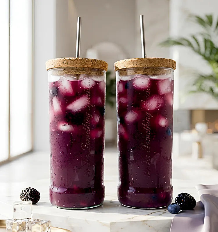Eco-friendly upcycled Smirnoff bottle sipper set of 2, handmade polished glass tumblers on wooden table
