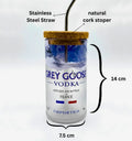 Eco friendly upcycled glass sipper filled with water, plastic-free drinkware