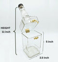 Recycled glass Jack Daniel's canister styled as home decor piece on wooden shelf