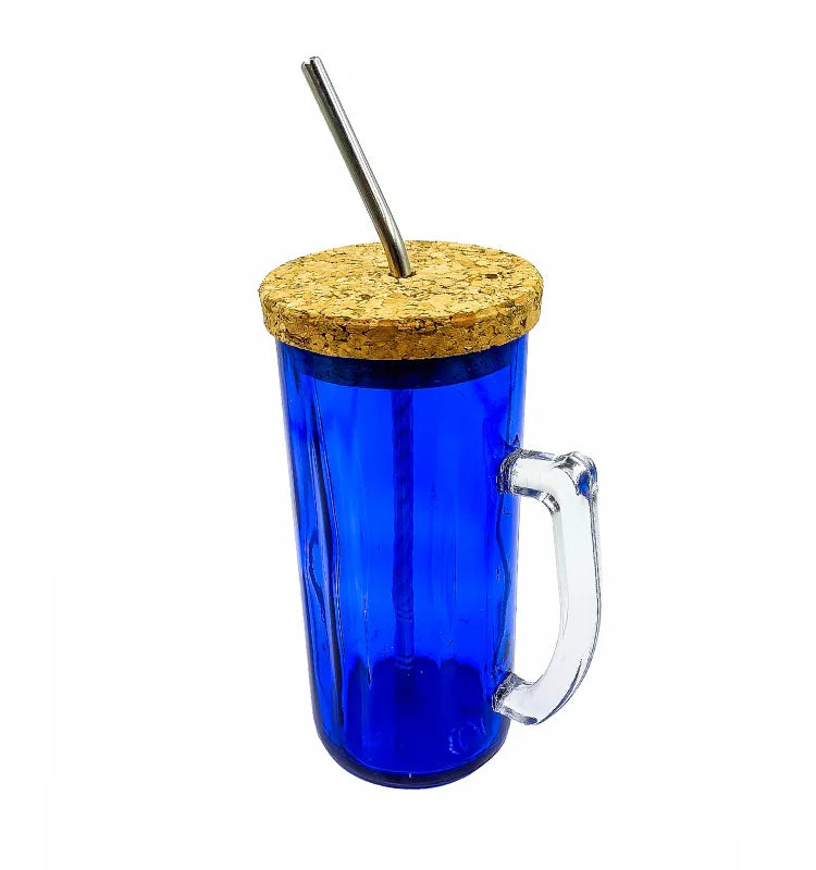 Sustainable upcycled 500ml glass sipper held in hand outdoors