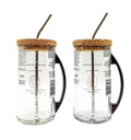 Sustainable upcycled glass sipper mug filled with coffee, lifestyle shot