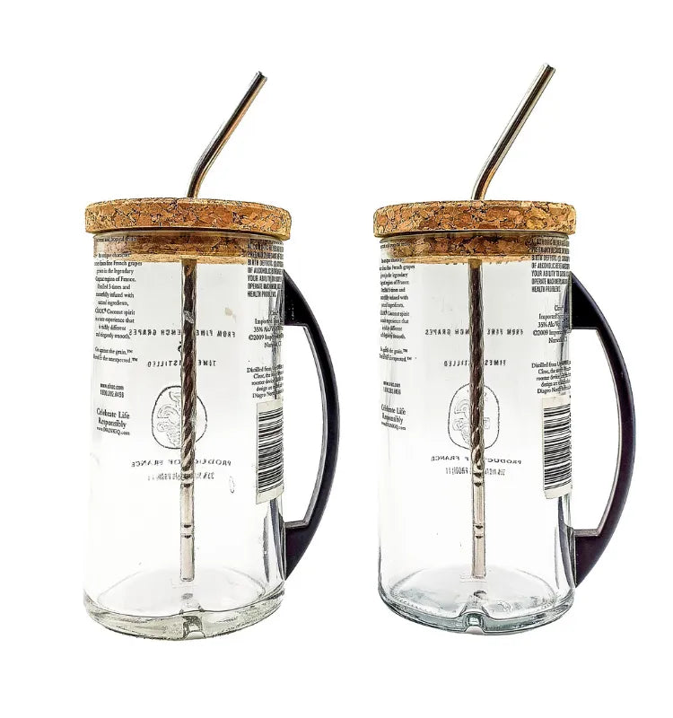 Sustainable upcycled glass sipper mug filled with coffee, lifestyle shot