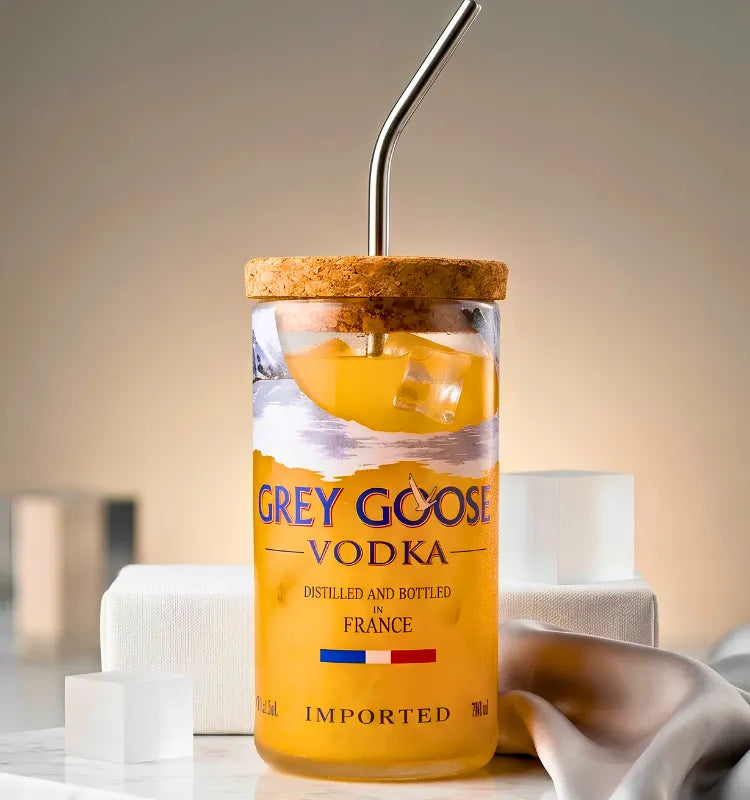 Upcycled Grey Goose glass sipper eco-friendly 450ml bottle on wooden table